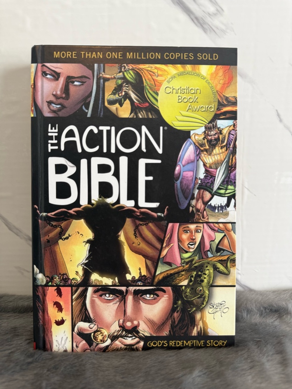 The Action Bible - Graphic Novel Bible (Black, Yellow, Purple)